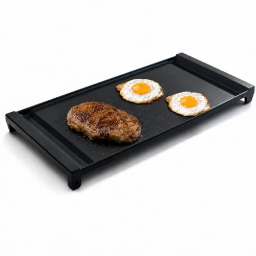 cast iron griddle on glass stove top